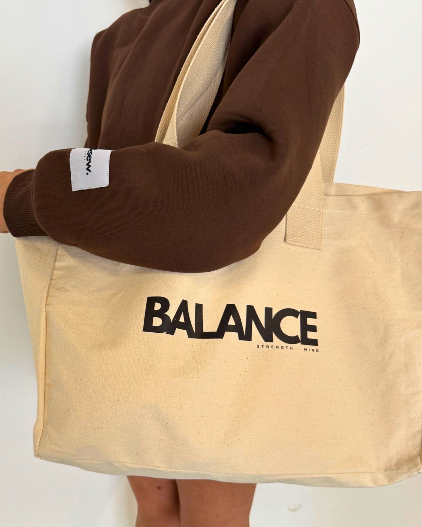 natural balance strength mind tote bag